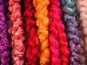 Colorful crochet braids styled elegantly in a close-up view.