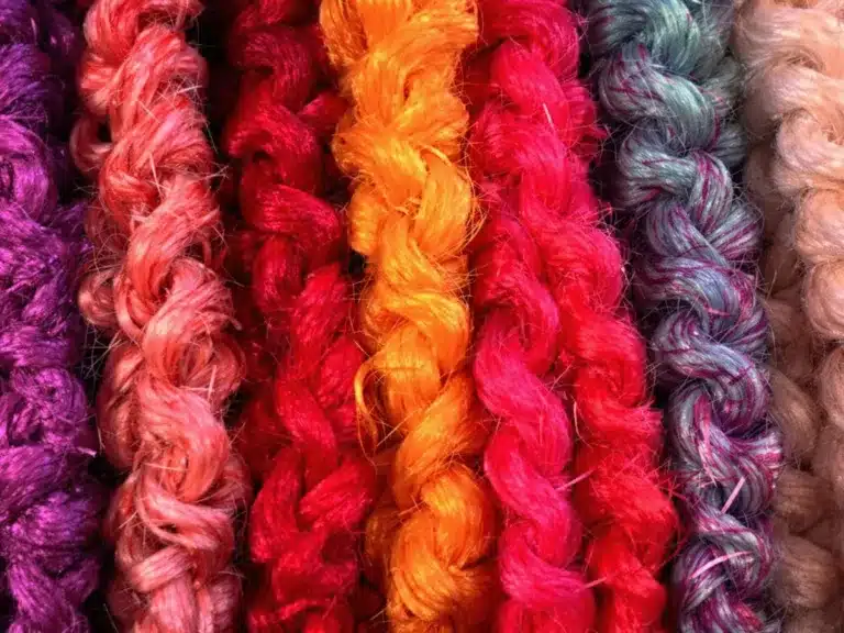 Colorful crochet braids styled elegantly in a close-up view.