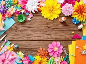 Colorful paper crafts displayed on a wooden table.